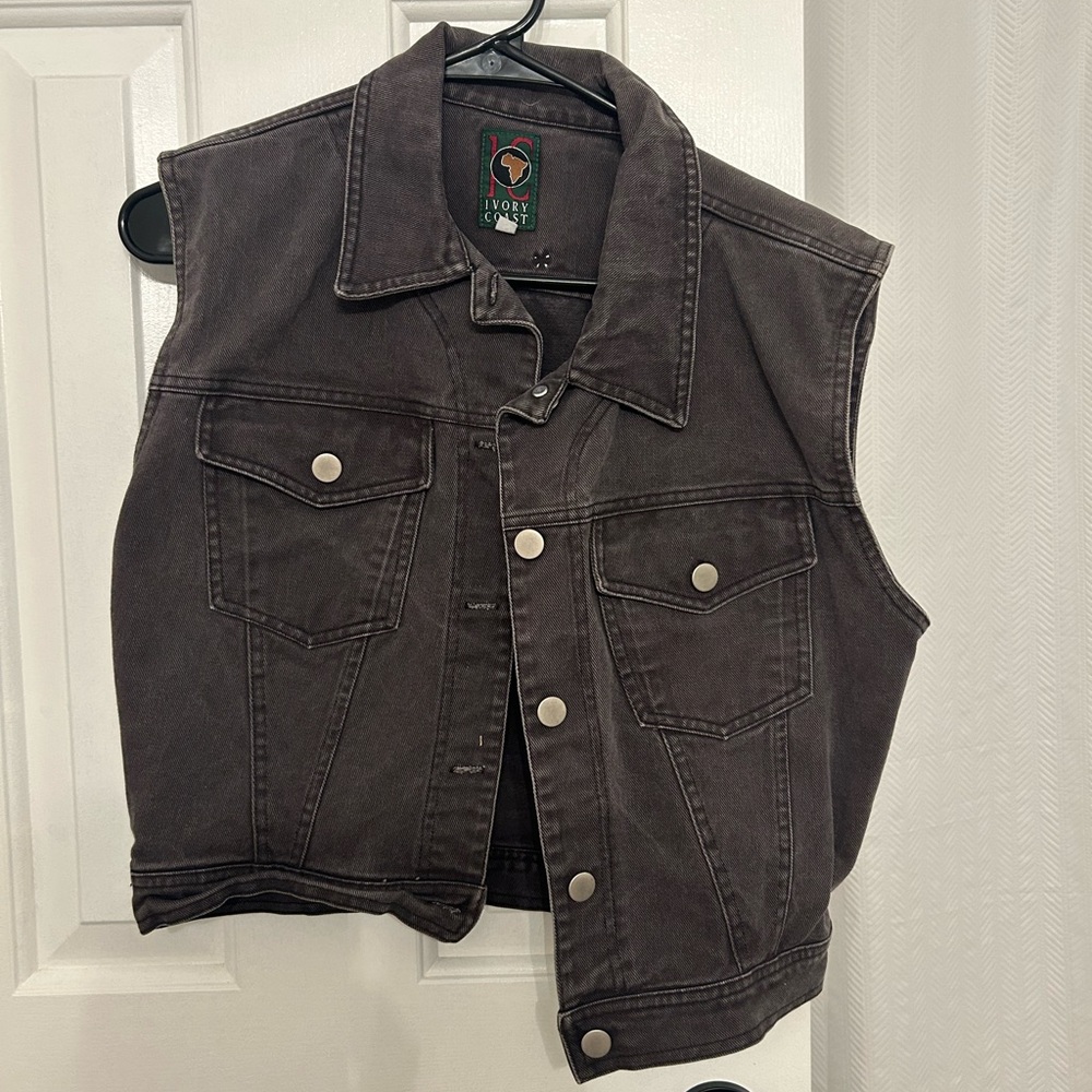 Black denim vest with sparks of silver